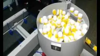 Вибро-ориентатор  податчик бутылочных крышек