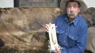 Pop Wagner making cinches at the Minnesota Horse Expo