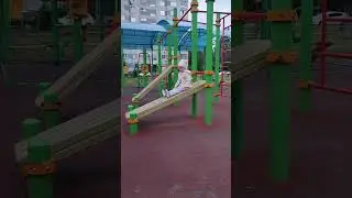 Тася на детской площадке