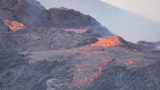 The crater of the volcano Fagradalsfjall in Iceland -lava flows constantly out of the top of crater