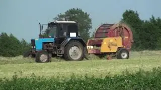 МТЗ 82.1 с рулонным пресс подборщиком.