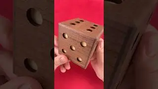 Use a rolling movement to open the Karakuri Dice box. 