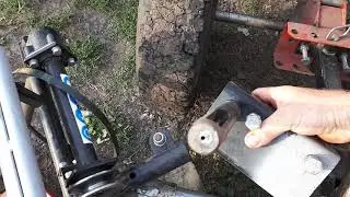 How to tension the belt on a KR-3 ZiD rotary mower for a Favorit walk-behind tractor. Answering y...