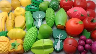 japanese mom with son playing vegetables