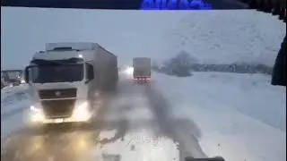 Russian truckers swearing over the radio. The sly one is stuck in a field, the others are laughing.