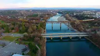Drone view of a Union Pacific Freight crossing the Redding Trestle Bridge