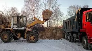 Погрузка HOWO Амкодором