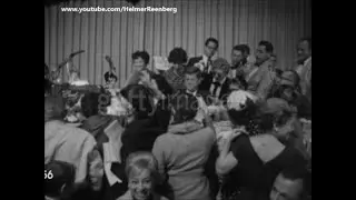 November 2, 1960 - Senator John F. Kennedy besieged for autographs by women fans at breakfast.