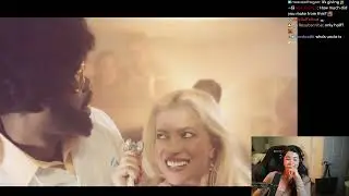 Caroline shows a hiphop music video she was in early in her career