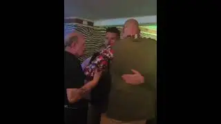 Tyson Fury getting escorted out of a pub in Morecambe before faceplanting on the pavement outside