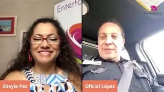 Sheyla Paz talks to Officer Lopez regarding PPE