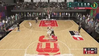 NBA 2K23 gath over the shoulder reverse standing dunk