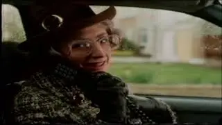 Beattie in Car with son Melvyn  She revels in showing off his new BT car phone