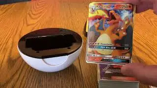 Opening a @pokemon Pokeball and showing a #charizardgx