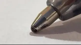 Insane closeup view of a Pen while writing