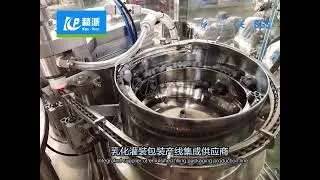 Two station pre-filled syringe vacuum filling machine