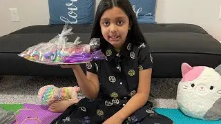 Anaya packing gifts for her school teachers and friends