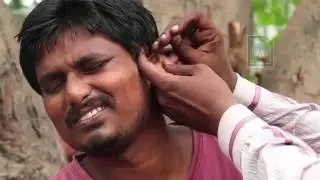 EAR STONES !!! Roadside Ear cleaner in India