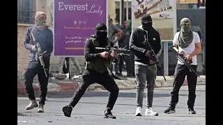 Israeli SNIPER hits Palestinian armed by Hamas in Gaza