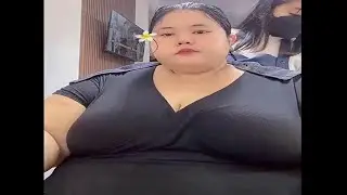 huge asian ssbbw model making her hair