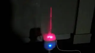 Laser illuminated ultrasonic humidifier