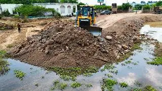 Swamp Landfill! Powerful Shantui Bulldozer Pushing Massive Rock Pile To Reclaim Muddy Wetland