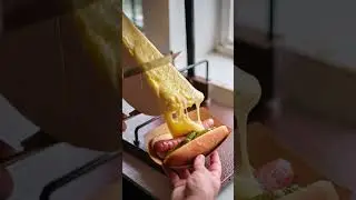 Only in the Midwest: Raclette Cheese Covered Hotdogs! 🧀🌭 #midwest #wisconsinlife #wisconsin