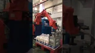 Industrial Robot Palletizing Bottled Milk 