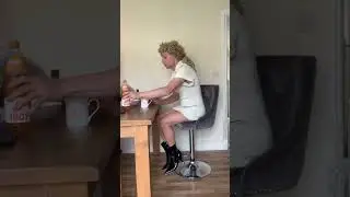 Crossdresser drinks Barr Irn Bru