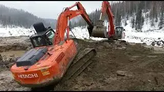 застрял экскаватор