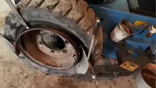 Как разобрать колесо от погрузчика