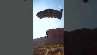 Athlete Does Backflip While BASE Jumping Off Clip | People Are Awesome #shorts