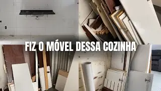 I made my friend's kitchen cabinet out of wood that was thrown in the trash.