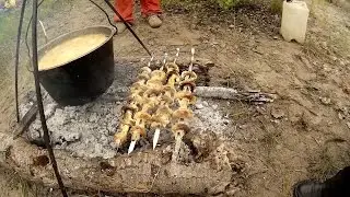 Kulesh and mushrooms on the island on the fire