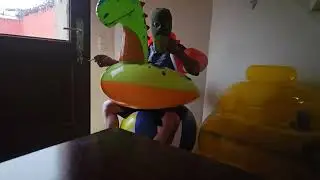 sitting inflatable beach ball smoking cigarette no popping