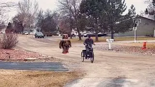 Grandpa tries out his landmine attachment on bike.