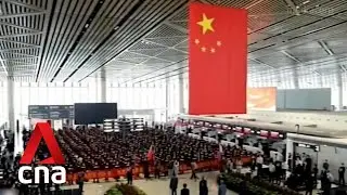 China defends zero-COVID strategy even as Shanghai logs record 21,000 new cases