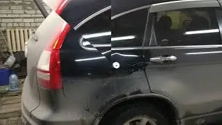 removing dents on the rear wing of the Honda CR-V