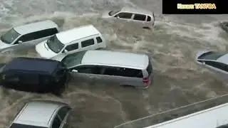 Broke through the dam. Houses and cars with people washed into the sea