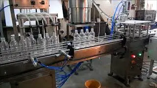 Automatic filling and capping line (4 head filler with rotary capper)