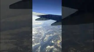 Spectacular views of snow covered European Alps from KLM flight