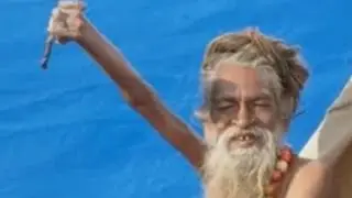 Holy man holds up hand for 40 years