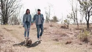 couple walking their dog