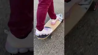 Practicing how to ride a skateboard 