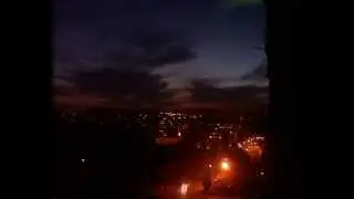 How looks timelapse with webcam. Town Sunset.