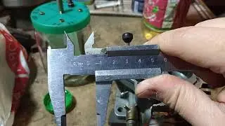 Measuring the fuel level in the float chamber of the Solex carburetor.