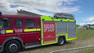 Fire Engines Rushing Round with Sirens and Lights