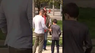 Father mistreats his son in public 