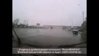 Лужа на въезде на Бугринский мост