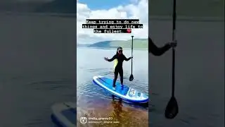 Paddle boarding at Dores Beach, Inverness.